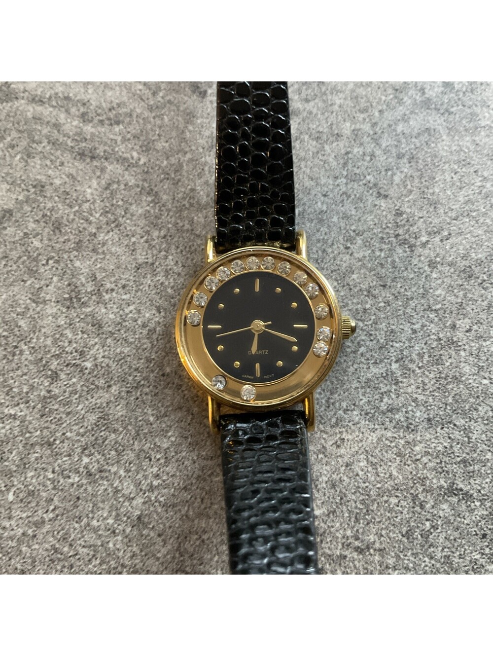 Vintage AVON Womens Watch Floating Rhinestone Bezel 24mm Gold tone Case A21